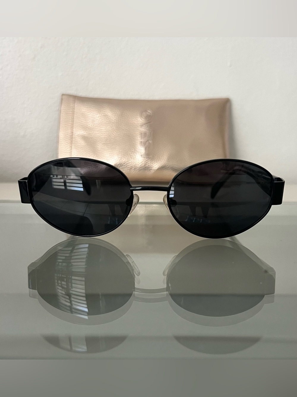 Classic Black Oval Women's Sunglasses with Slim Metal Frame
